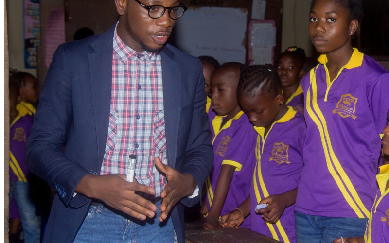 Tosin Ikuyiminu talking to School children at AVW Career Education CSR initiative